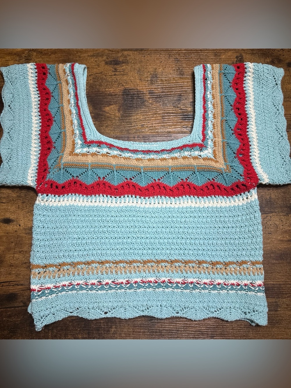 Crochet top with blue, red, and tan stripes